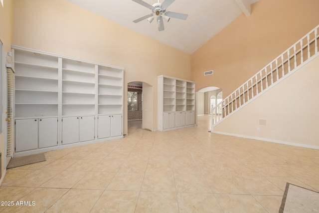 728 W Sandra Ter, Phoenix, AZ 85023 - unfurnished room with arched walkways, ceiling fan, high vaulted ceiling, and light tile patterned flooring
