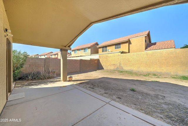 view of patio with a fenced backyard