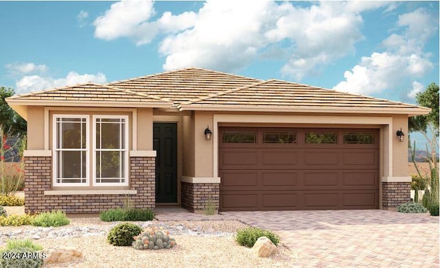 view of front of property with a garage