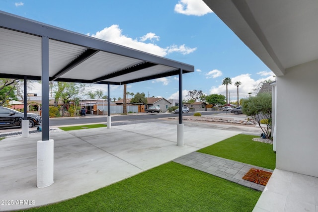 view of parking featuring a residential view