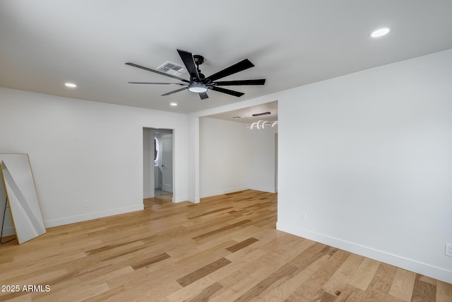 unfurnished room featuring visible vents, light wood-style flooring, and recessed lighting
