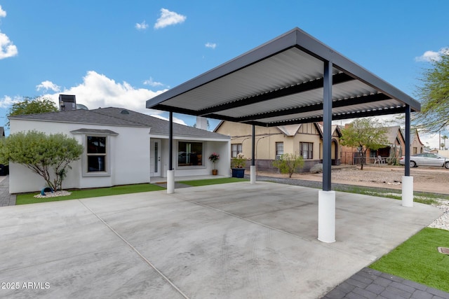 exterior space featuring a carport