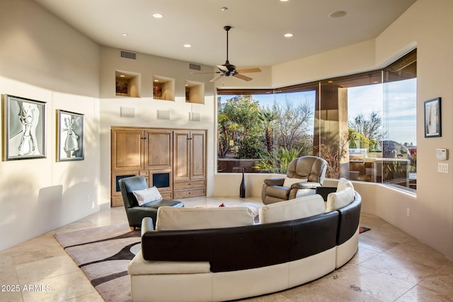 living room featuring ceiling fan