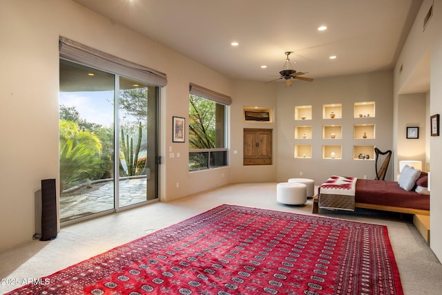 living room featuring ceiling fan