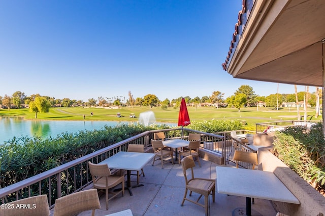 view of patio featuring a water view