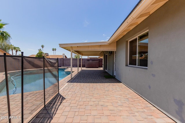 view of swimming pool featuring a fenced in pool, a fenced backyard, and a patio area