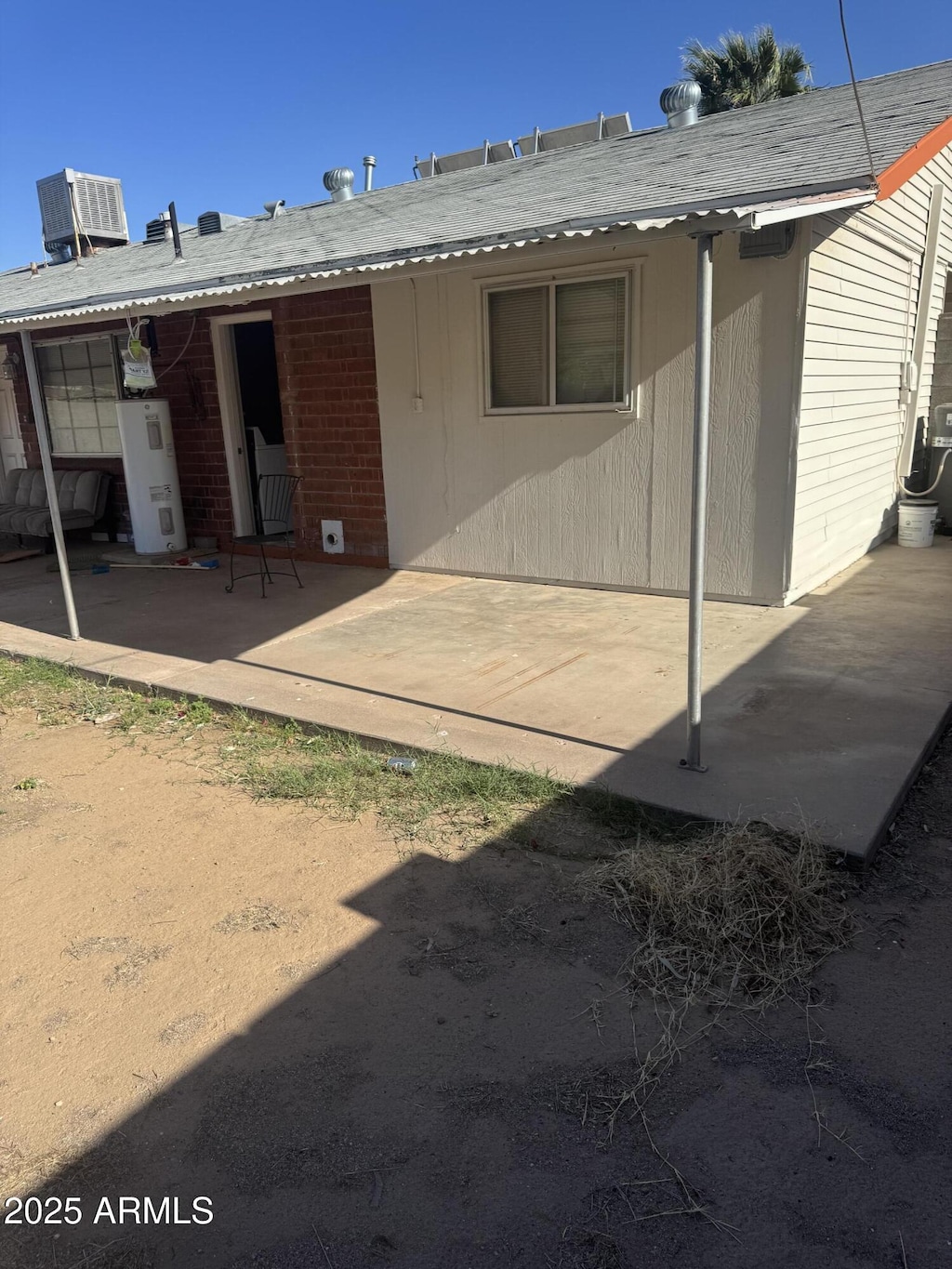 3226 W Maryland Ave, Phoenix, AZ 85017 - back of house with a patio, brick siding, and cooling unit