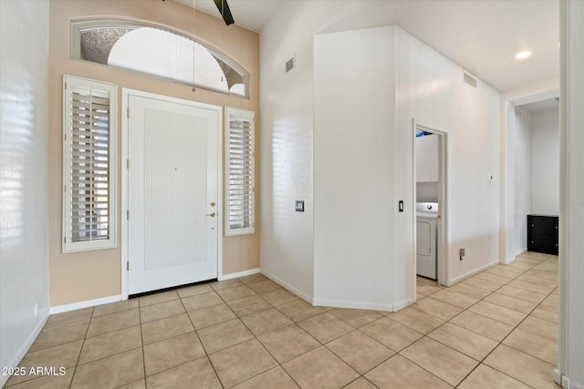 5005 E Baker Dr, Cave Creek, AZ 85331 - foyer with baseboards, washer / clothes dryer, visible vents, and light tile patterned floors