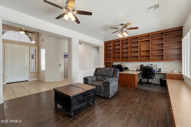5005 E Baker Dr, Cave Creek, AZ 85331 - office space with built in desk, a healthy amount of sunlight, wood finish floors, visible vents, and a ceiling fan