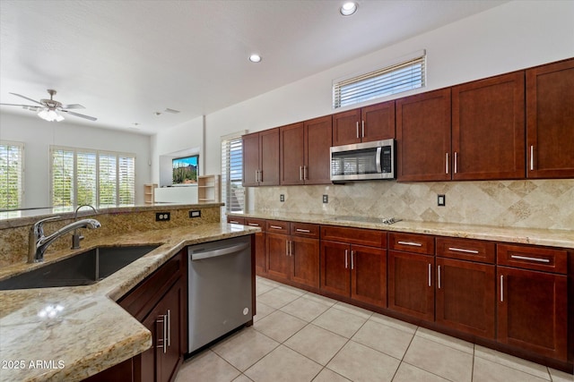 5005 E Baker Dr, Cave Creek, AZ 85331 - kitchen with a sink, tasteful backsplash, appliances with stainless steel finishes, light tile patterned floors, and ceiling fan