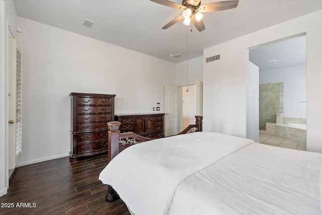 5005 E Baker Dr, Cave Creek, AZ 85331 - bedroom with wood finished floors, ensuite bath, baseboards, visible vents, and ceiling fan