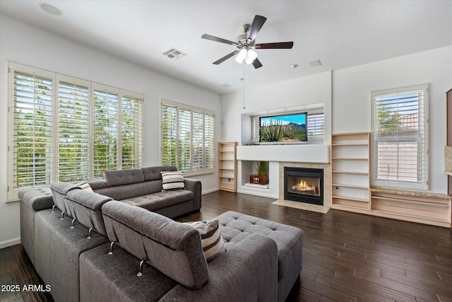 5005 E Baker Dr, Cave Creek, AZ 85331 - living area with a healthy amount of sunlight, visible vents, a ceiling fan, and dark wood-style flooring