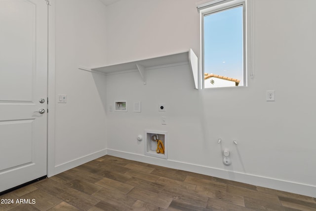 laundry area featuring dark wood-type flooring, washer hookup, hookup for an electric dryer, and gas dryer hookup