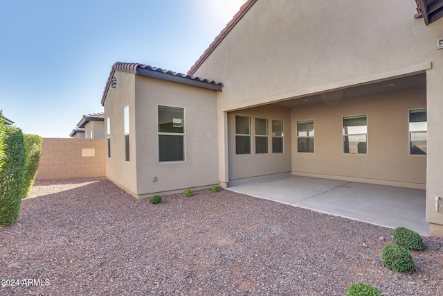 rear view of house featuring a patio area