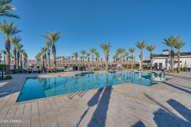 view of pool featuring a patio area