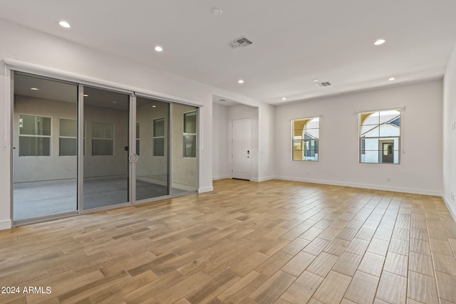 empty room with light wood-type flooring