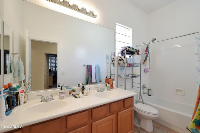 full bathroom featuring vanity, toilet, and shower / bath combo with shower curtain