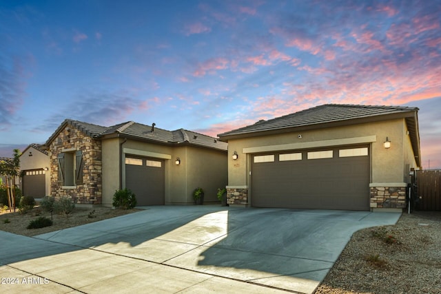 prairie-style house featuring a garage