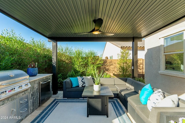 view of patio / terrace with area for grilling, ceiling fan, an outdoor living space, and a grill