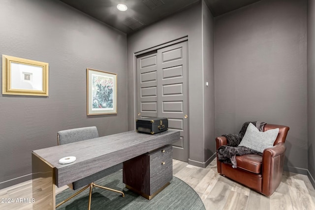 home office featuring light hardwood / wood-style floors