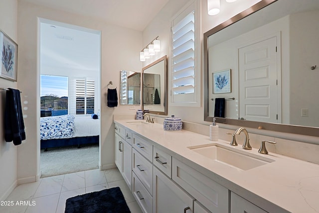 bathroom with vanity and tile patterned floors