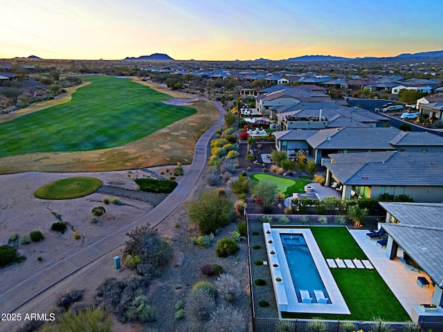 aerial view at dusk with a mountain view