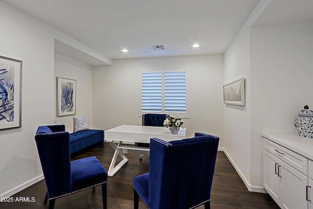 dining space featuring dark hardwood / wood-style flooring