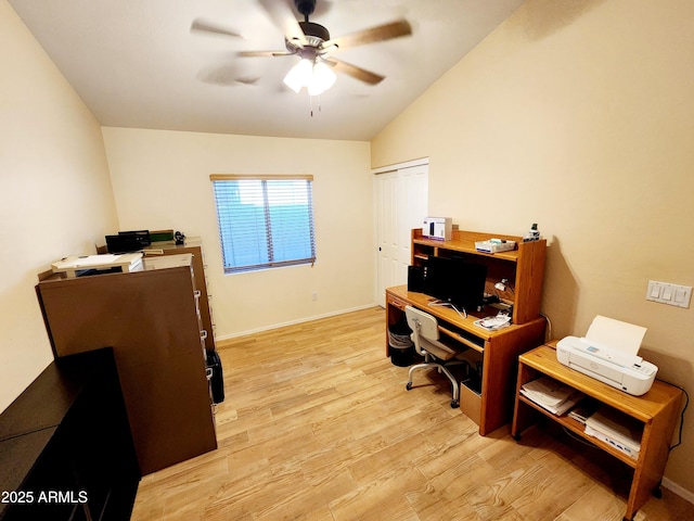 office with ceiling fan, lofted ceiling, and light wood-type flooring