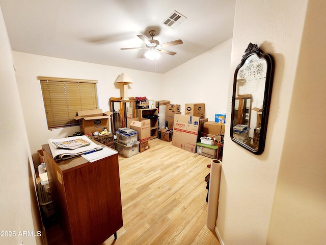 home office with ceiling fan and wood-type flooring