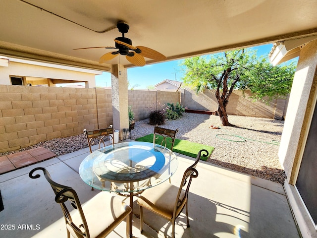 view of patio with ceiling fan