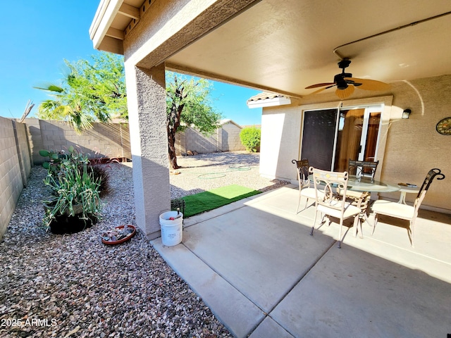 view of patio with ceiling fan