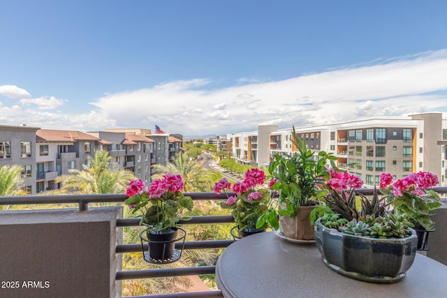 balcony featuring a residential view