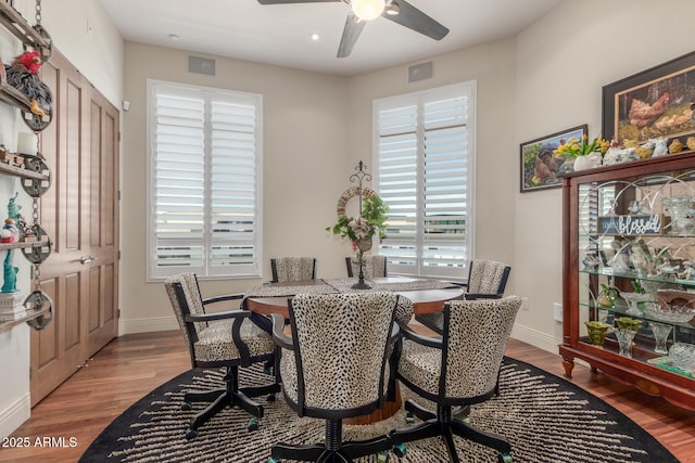 dining room featuring light wood-style floors and plenty of natural light