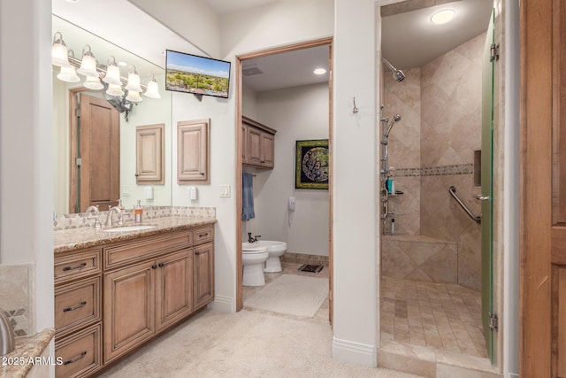 bathroom featuring a bidet, baseboards, a shower stall, vanity, and recessed lighting