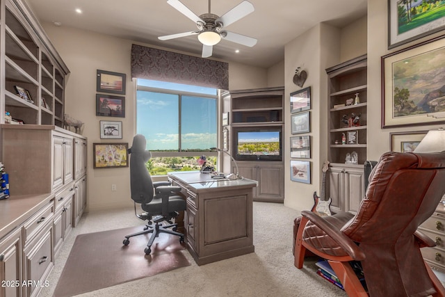 office space with light colored carpet, built in features, ceiling fan, and recessed lighting