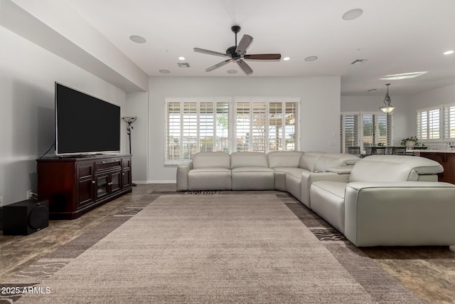 living room with ceiling fan