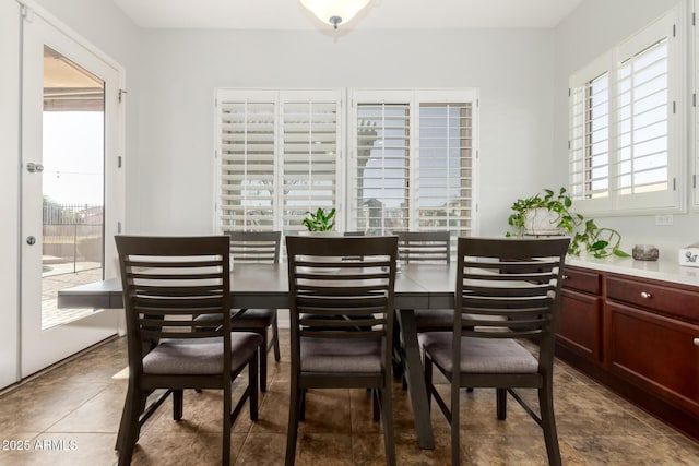 dining area featuring tile patterned floors