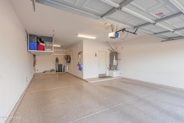 garage featuring gas water heater and a garage door opener