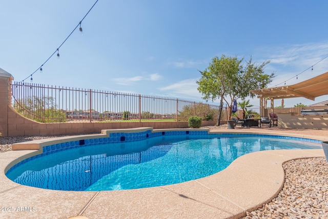 view of swimming pool featuring a patio