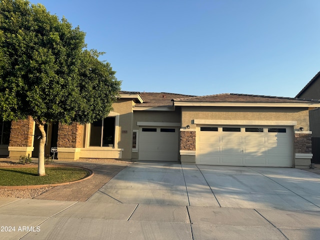 view of front of property with a garage