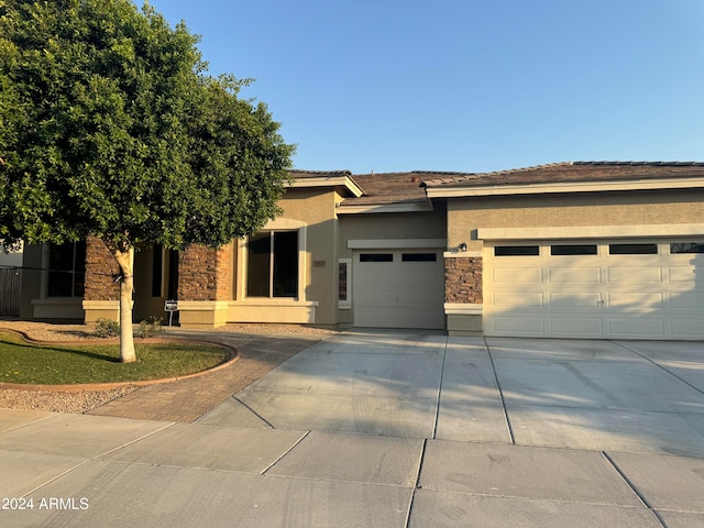 view of front of property featuring a garage