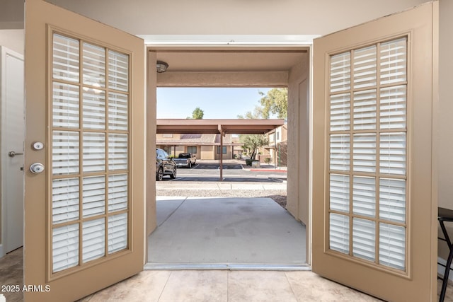 entryway featuring tile patterned flooring