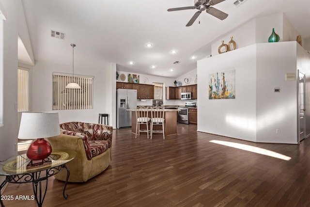 living room featuring ceiling fan, dark wood-type flooring, high vaulted ceiling, and sink