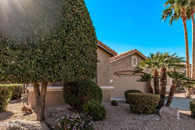 view of front of property with a garage