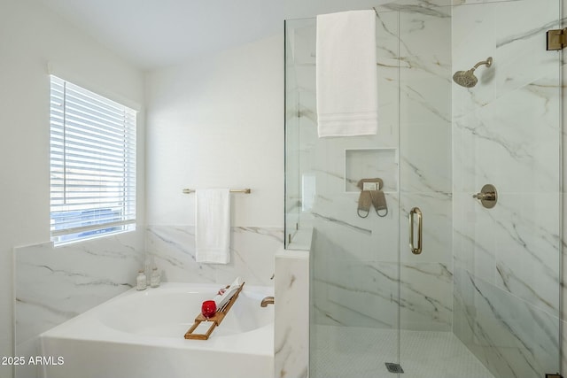 full bathroom with a garden tub and a shower stall