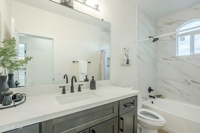 full bathroom featuring shower / washtub combination, vanity, and toilet