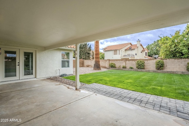 view of patio featuring fence private yard and french doors