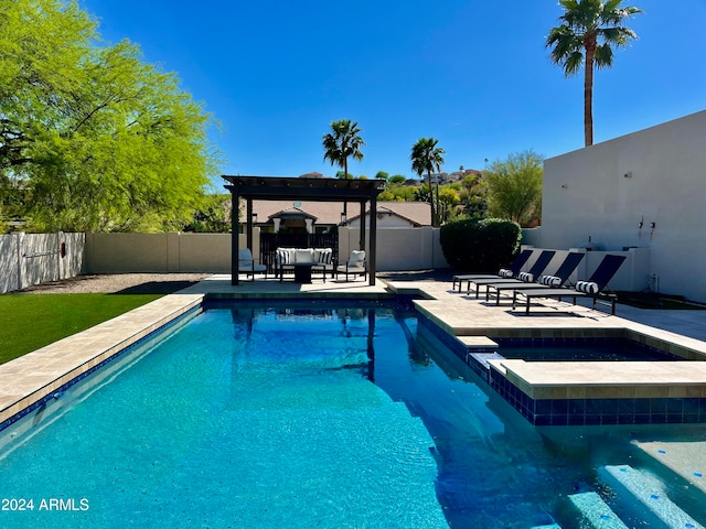 view of swimming pool with a patio and a pergola