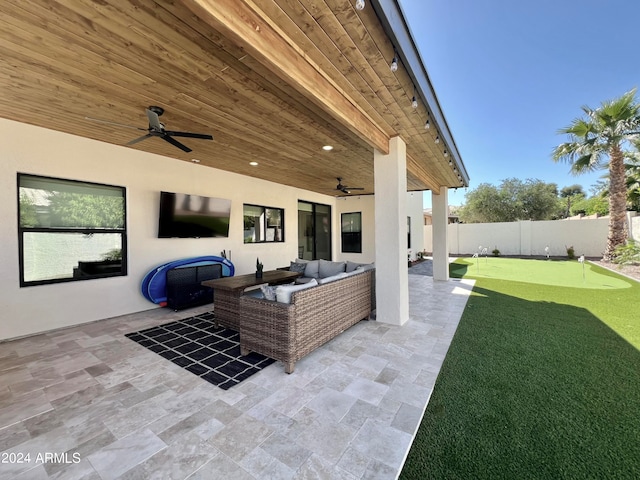 view of patio / terrace with ceiling fan and outdoor lounge area