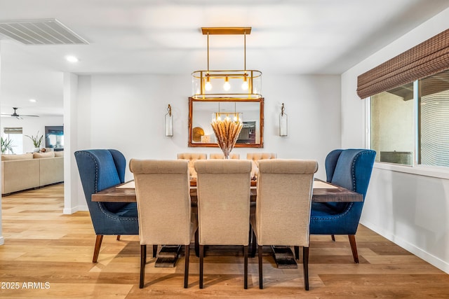 dining space featuring visible vents, wood finished floors, baseboards, and recessed lighting
